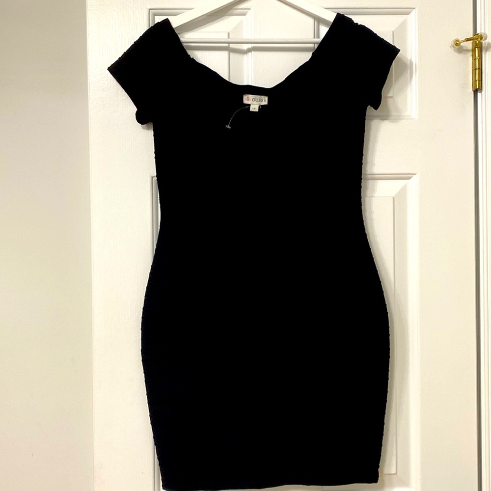 Guess black off the shoulder dress. Stretchy. Size Large.